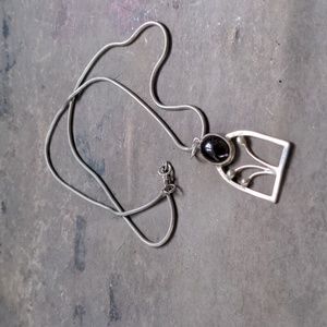 Sterling silver and garnet floral pendant necklace